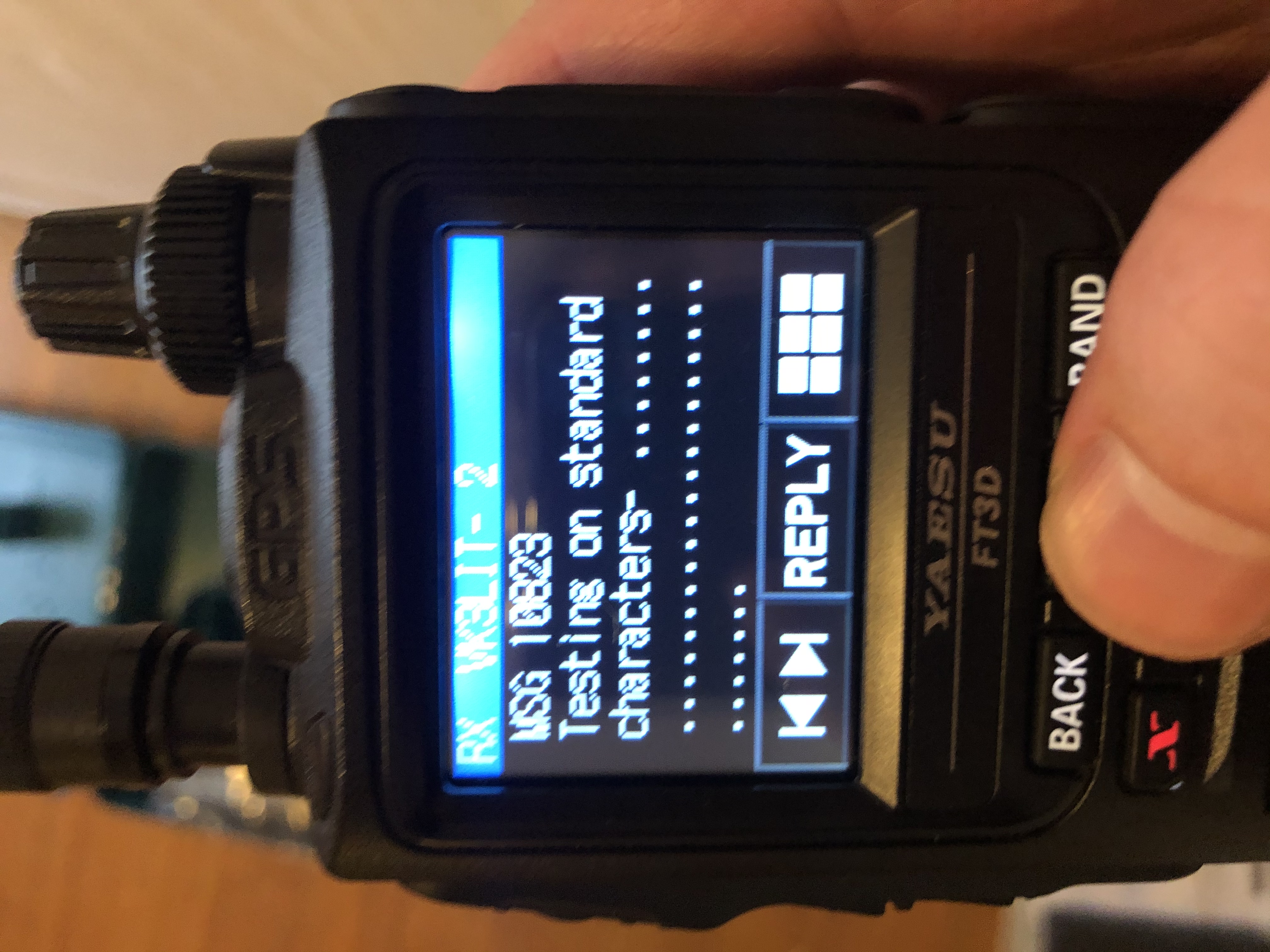 Close-up of Yaesu FT-3D receiving a message